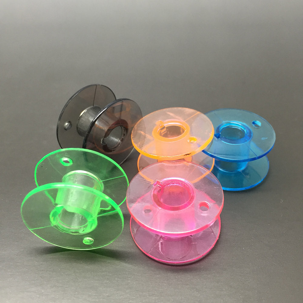 25 coloured bobbins in a box – Sewing Machine Accessories
